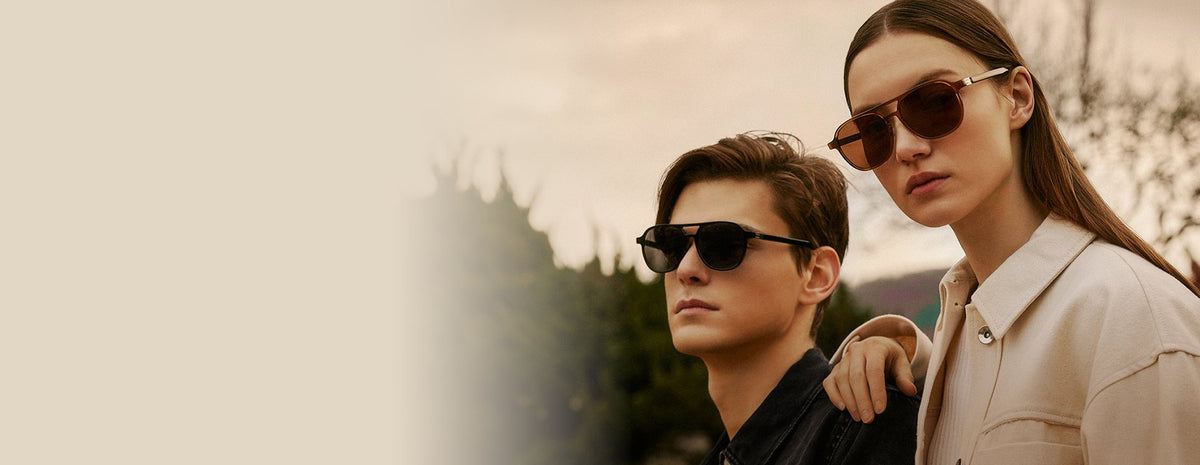Man and woman in VYCOZ sunglasses outdoors
