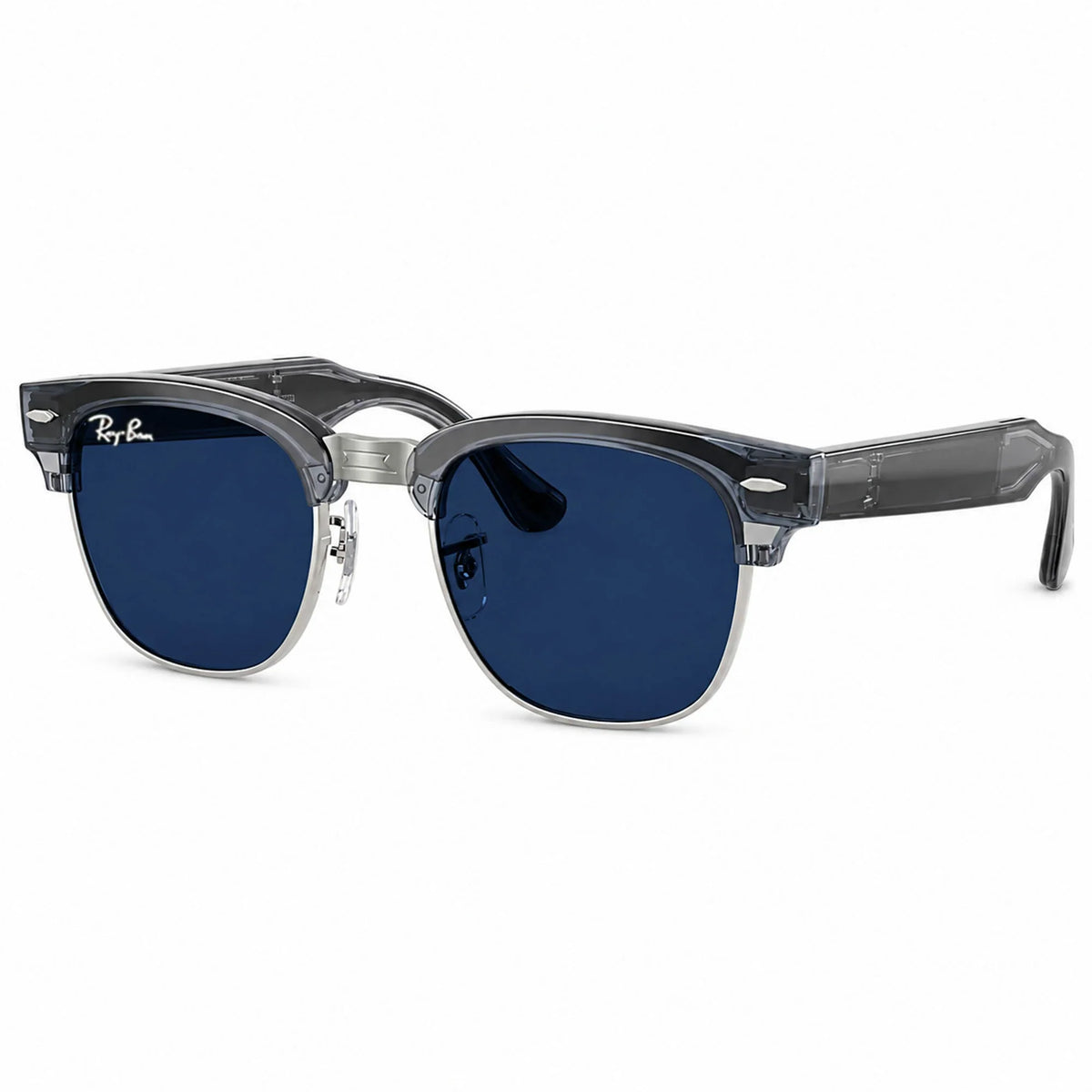 Ray-Ban Meta Clubmaster Audio glasses, Transparent Sky Blue frame with Transitions® Sapphire lenses, three-quarter view, Ray-Ban lens logo