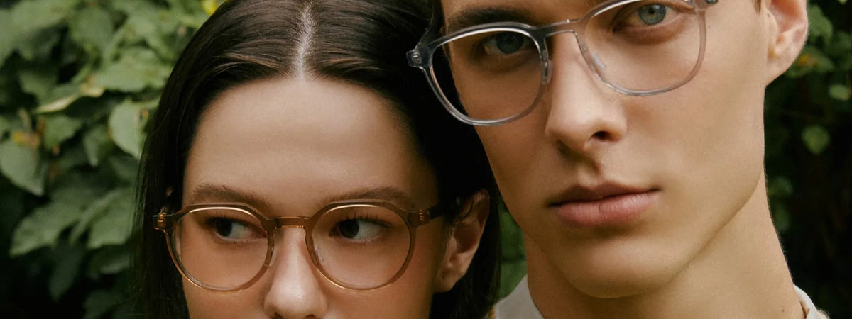 Man and woman in VYCOZ acetate glasses in a garden