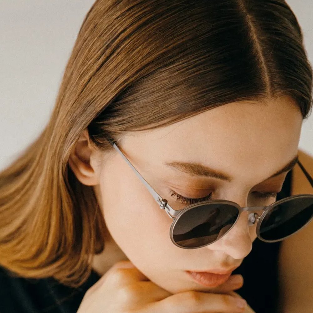 Woman in VYCOZ sunglasses