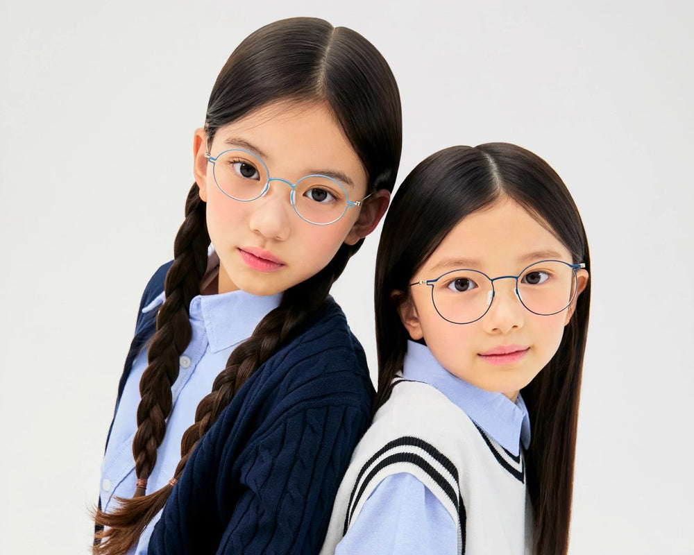 Two children in thin metal VYCOZ Max Teeny glasses